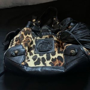 Authentic juicy couture, cheetah, print purse purple on the inside